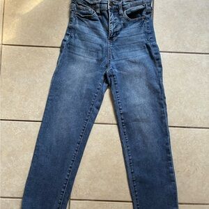 Fashion nova high-rise, straight leg jeans in a medium wash with a raw hem